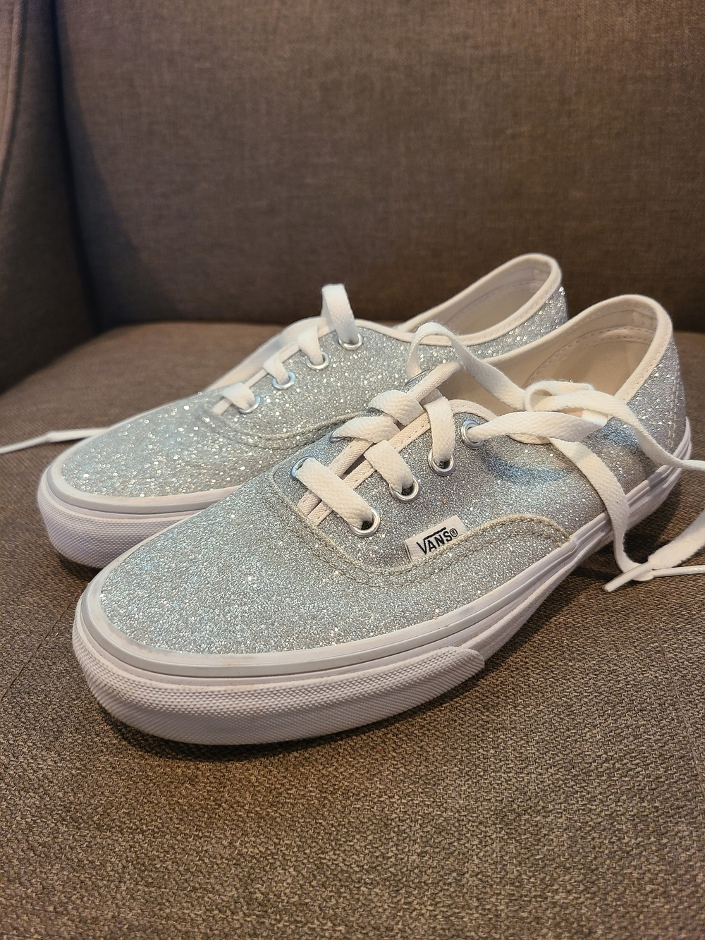Vans low-top sneakers featuring a sparkling silver glitter size 6.5